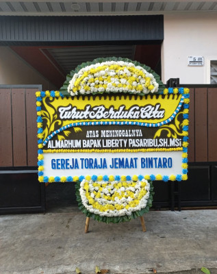 Papan Bunga Duka di Maliku
